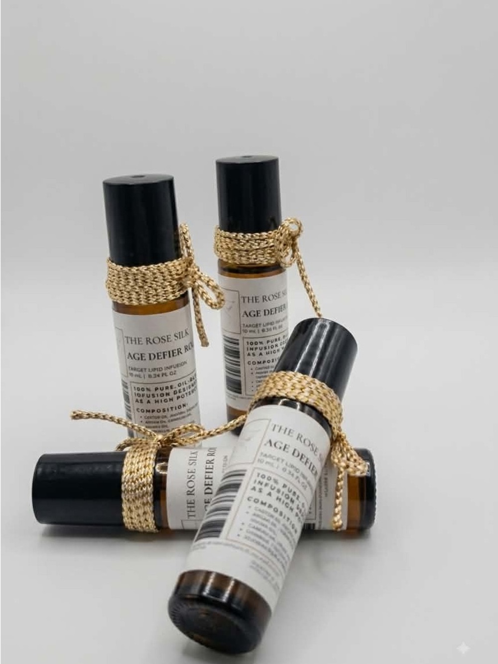 Age Defier Roll-On Serum - Gold Accent